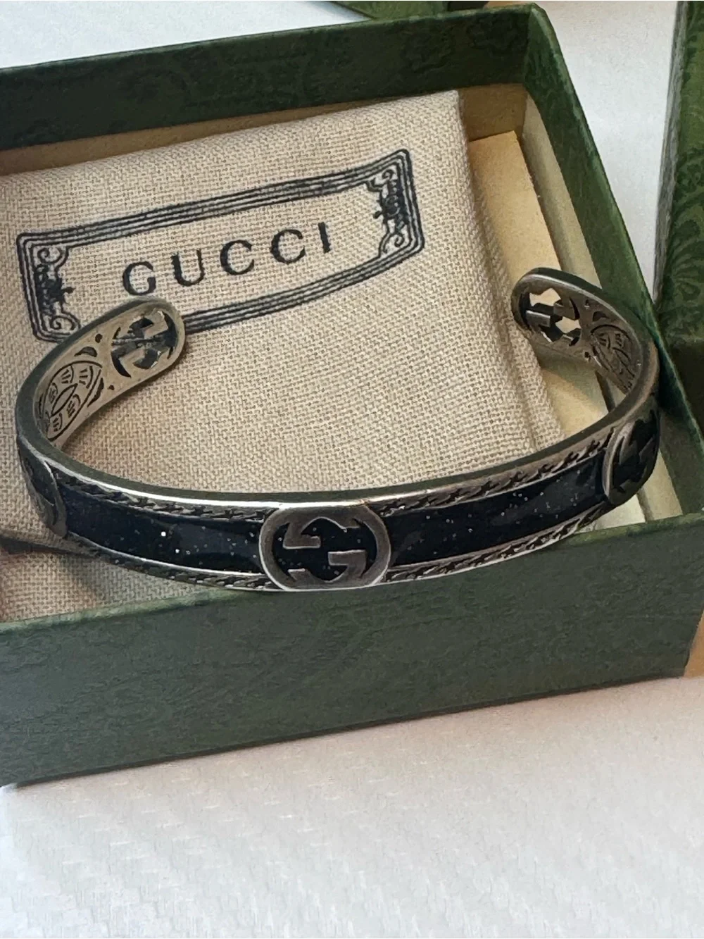 Gucci Silver-Tone Cuff with Black Inlay and Interlocking G Detail